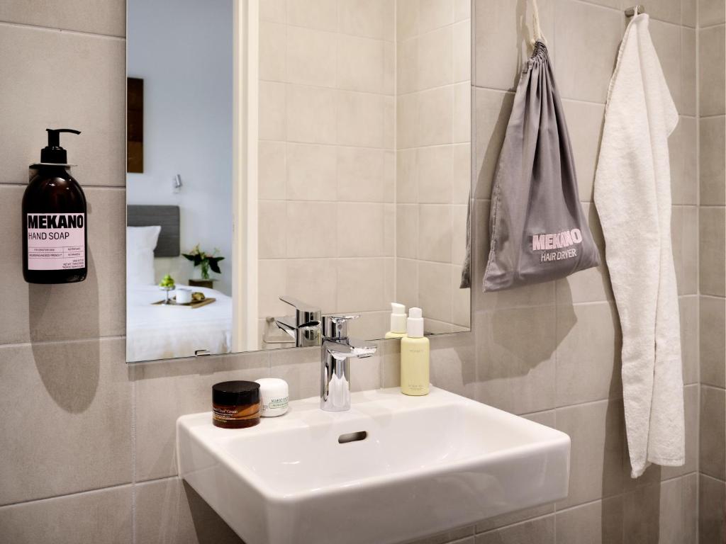 Koupelna v ubytování Mekano Apartment Hotel