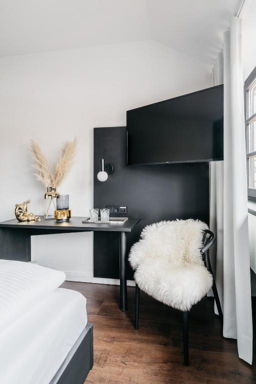 Ein Bett oder Betten in einem Zimmer der Unterkunft Hotel Riesengebirge