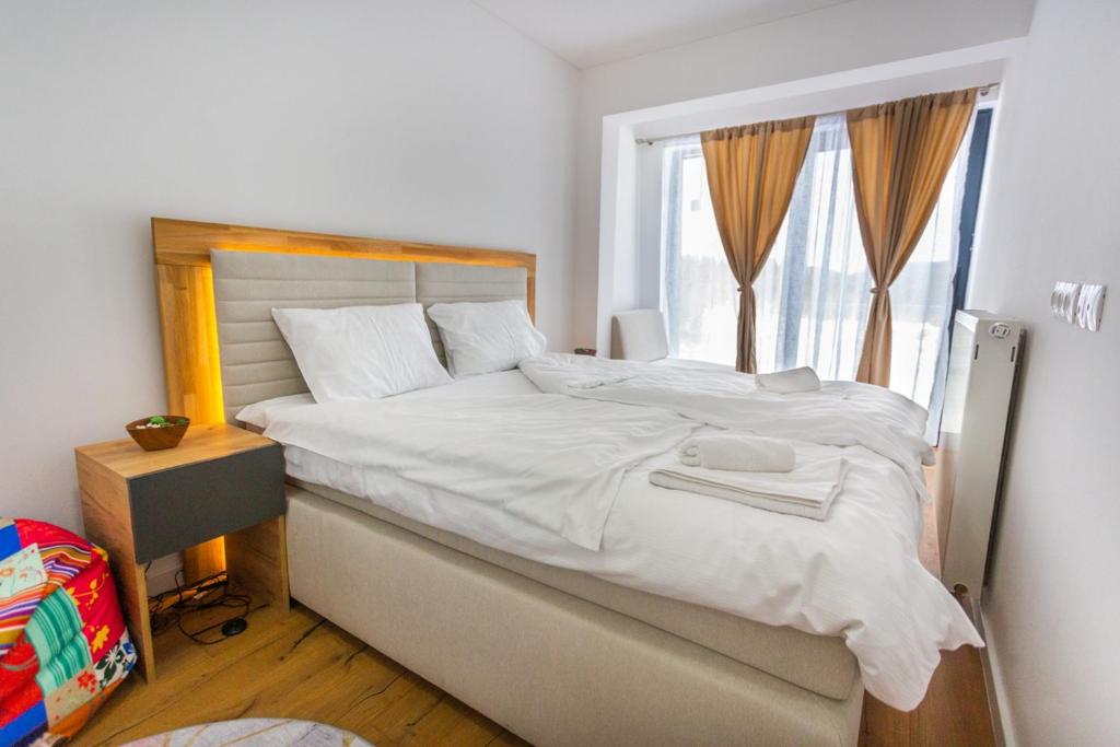 Postel nebo postele na pokoji v ubytování Aparthotel Phoenix