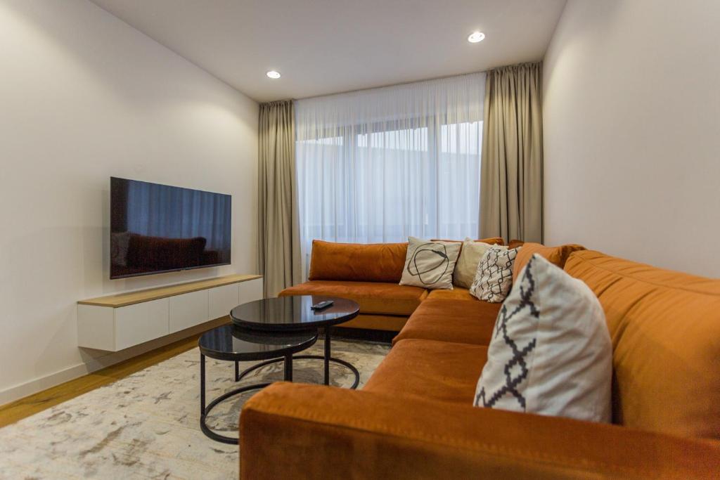 TV a/nebo společenská místnost v ubytování Aparthotel Phoenix