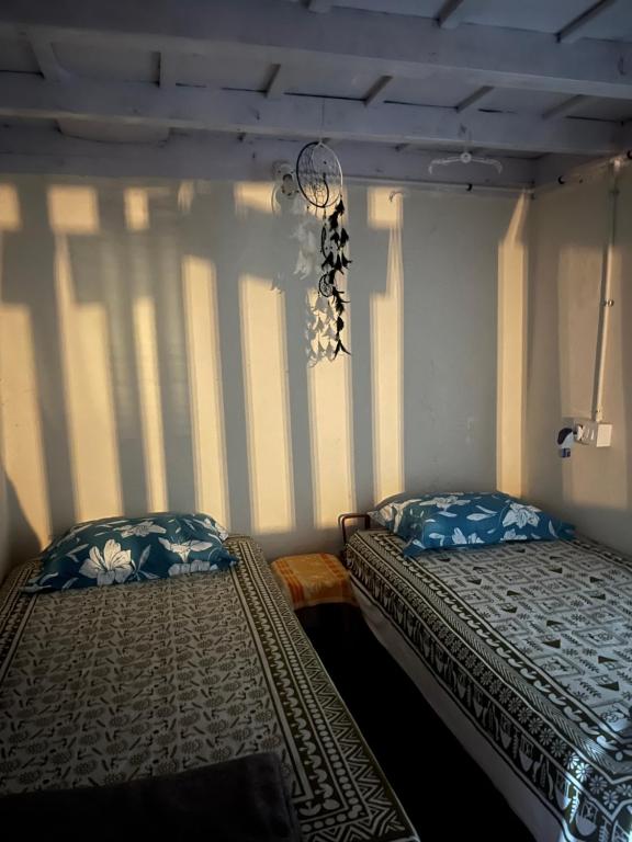 Postel nebo postele na pokoji v ubytování TauSco Homestay & Campsite - Coorg
