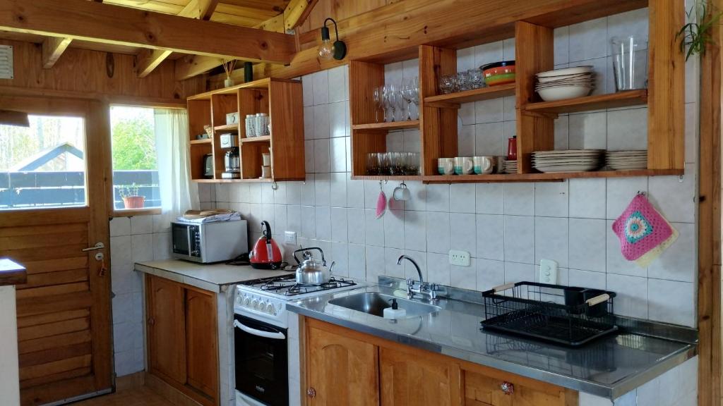 Kuchyň nebo kuchyňský kout v ubytování Cabaña los teros