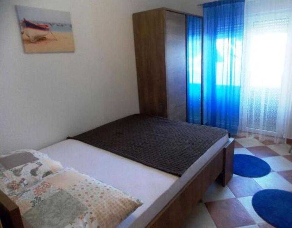 Posteľ alebo postele v izbe v ubytovaní Apartments Sanja