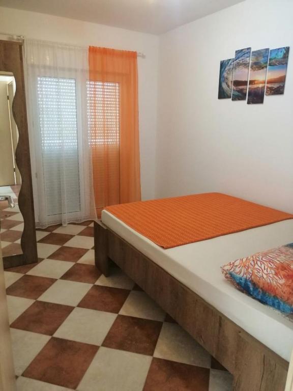 Posteľ alebo postele v izbe v ubytovaní Apartments Sanja