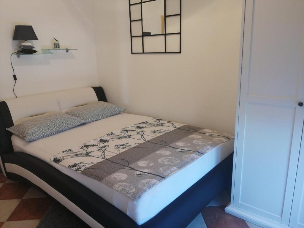 Posteľ alebo postele v izbe v ubytovaní Apartments Sanja