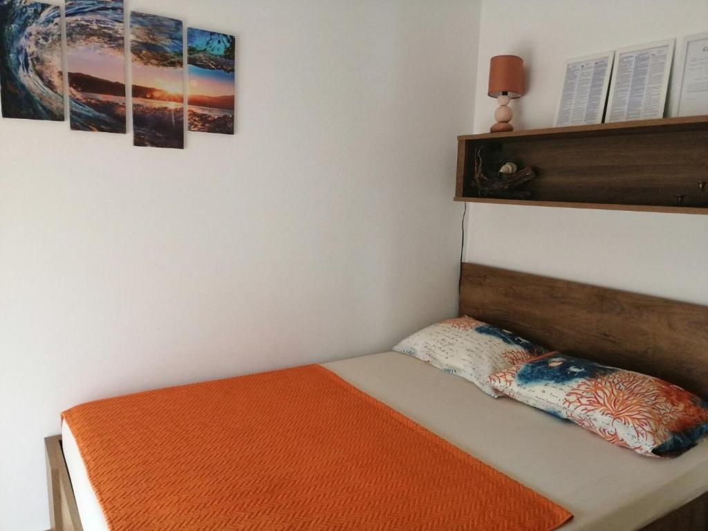 Posteľ alebo postele v izbe v ubytovaní Apartments Sanja