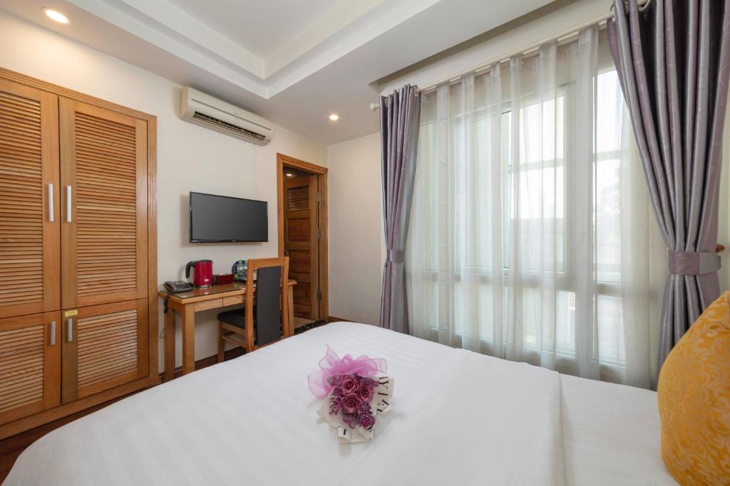 TV a/nebo společenská místnost v ubytování Hanoi Sky Hotel