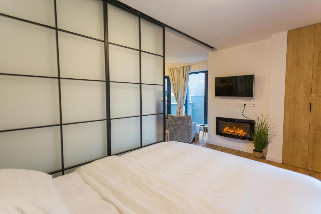 Postel nebo postele na pokoji v ubytování Aparthotel Phoenix