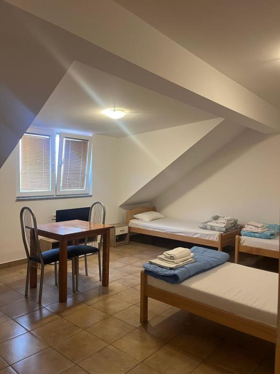 Postel nebo postele na pokoji v ubytování Prenočišče Buco