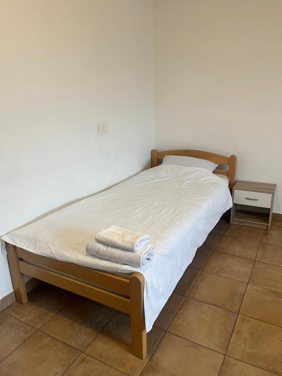 Postel nebo postele na pokoji v ubytování Prenočišče Buco