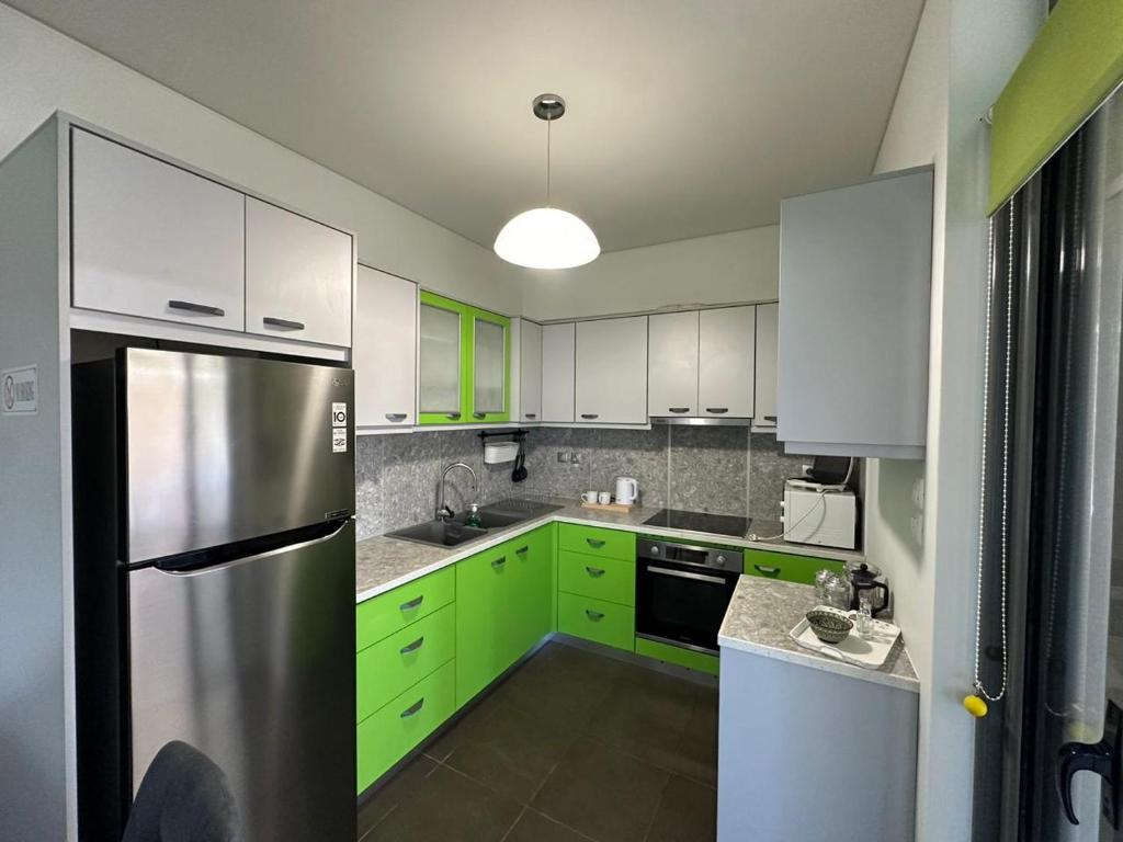 Kuchyň nebo kuchyňský kout v ubytování Elysian apartment II