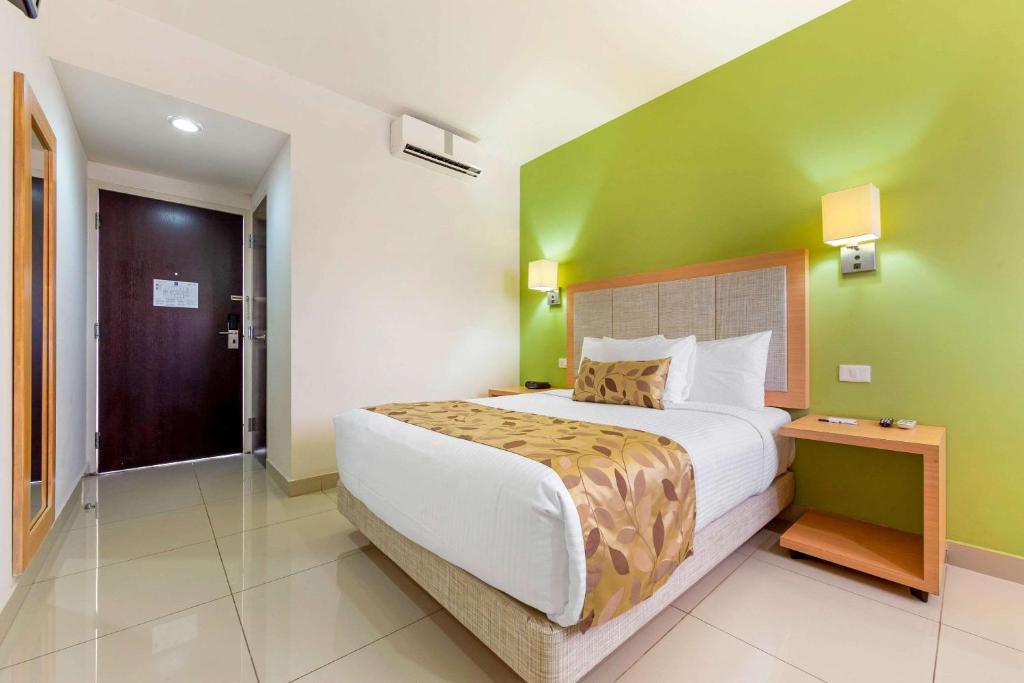 Postel nebo postele na pokoji v ubytování Sleep Inn Culiacan