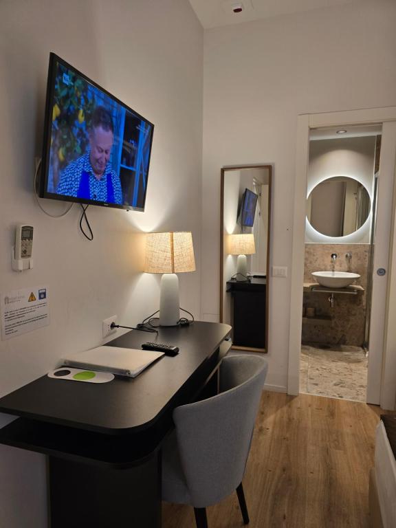 TV a/nebo společenská místnost v ubytování Hotel Porta Pia