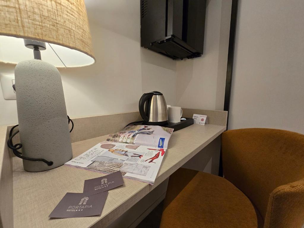 Příslušenství pro přípravu čaje a kávy v ubytování Hotel Porta Pia