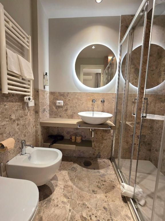 Koupelna v ubytování Hotel Porta Pia