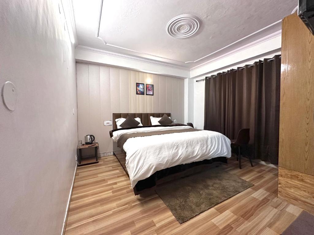 Katil atau katil-katil dalam bilik di The Misty Pines Inn
