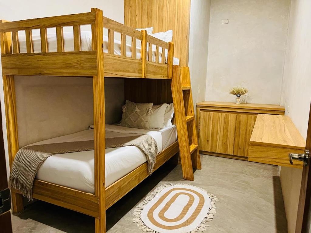 Postel nebo postele na pokoji v ubytování Lio Villas Resort