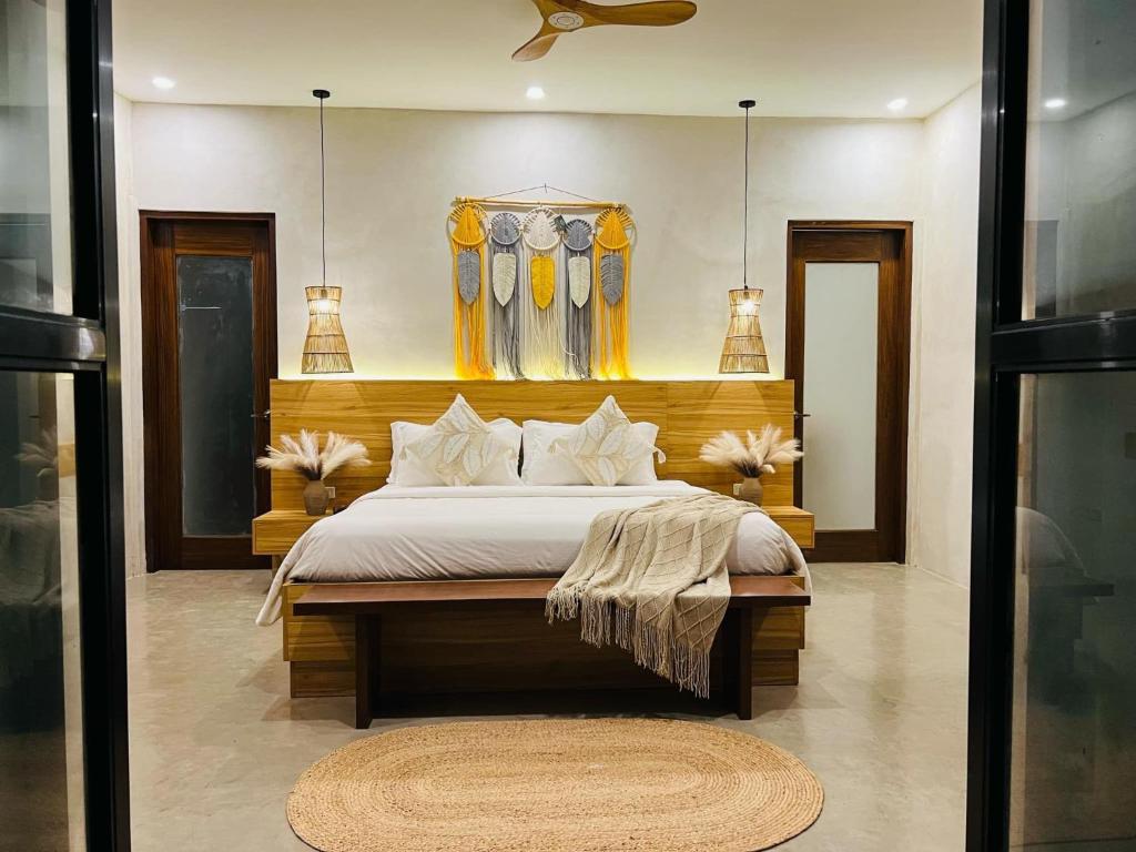 Postel nebo postele na pokoji v ubytování Lio Villas Resort