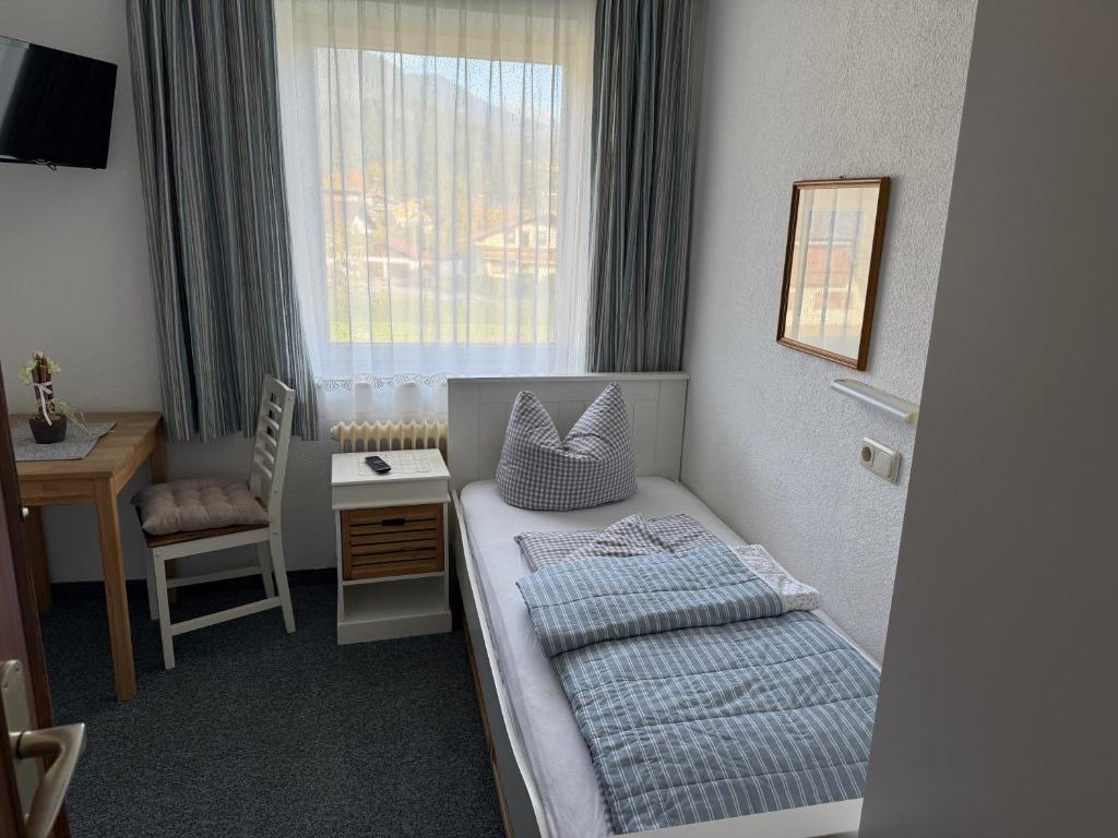Postel nebo postele na pokoji v ubytování Mühler Hof