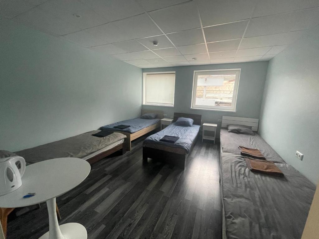Postel nebo postele na pokoji v ubytování HOSTEL/HOTELL 3A