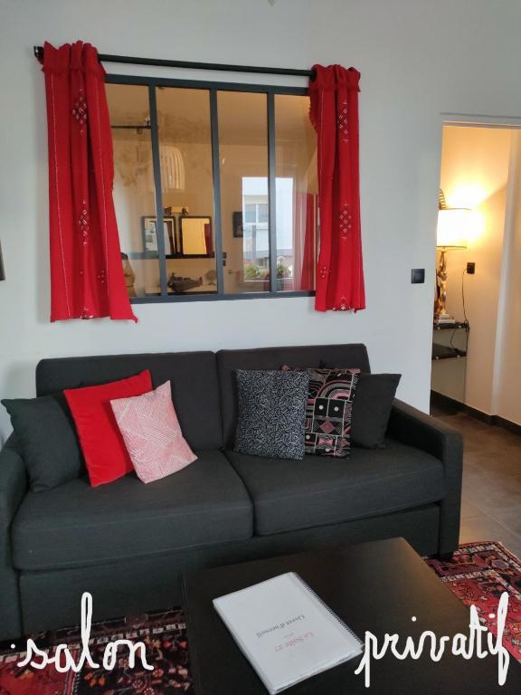 Posezení v ubytování La Suite 27, proche gare et centre ville