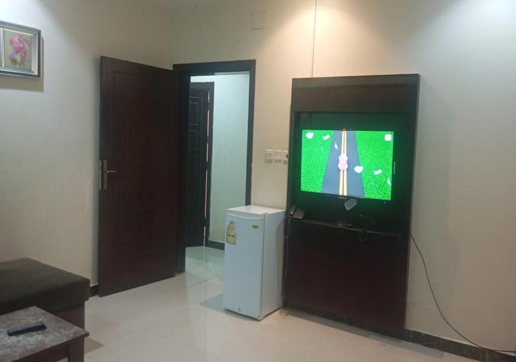 TV a/nebo společenská místnost v ubytování خالد بن علي ضيافة خاص