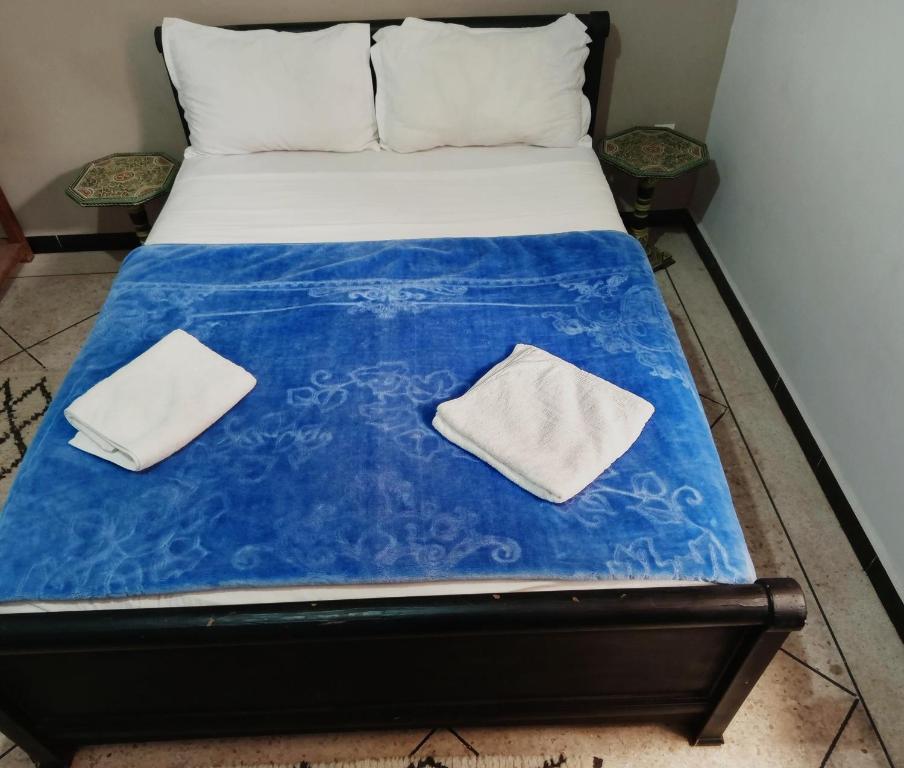 Afgo Hostelにあるベッド