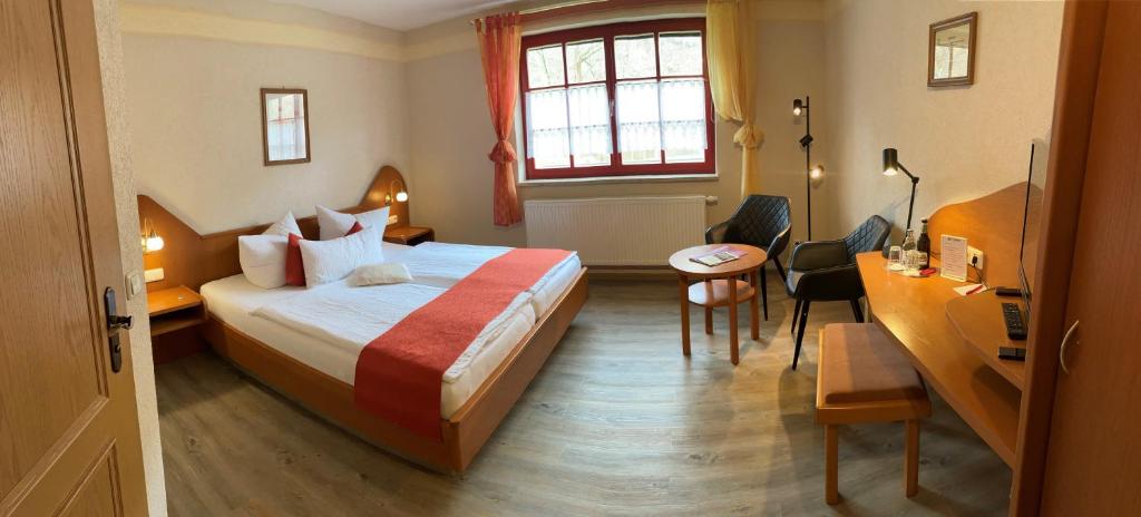 Voodi või voodid majutusasutuse Hotel Zur Fernmühle toas
