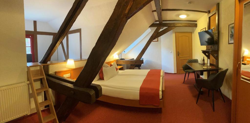 Voodi või voodid majutusasutuse Hotel Zur Fernmühle toas