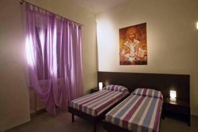 Postel nebo postele na pokoji v ubytování Santa Marta