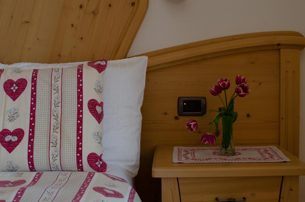 Postel nebo postele na pokoji v ubytování Agritur Coryletum