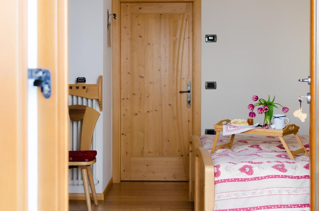 Postel nebo postele na pokoji v ubytování Agritur Coryletum
