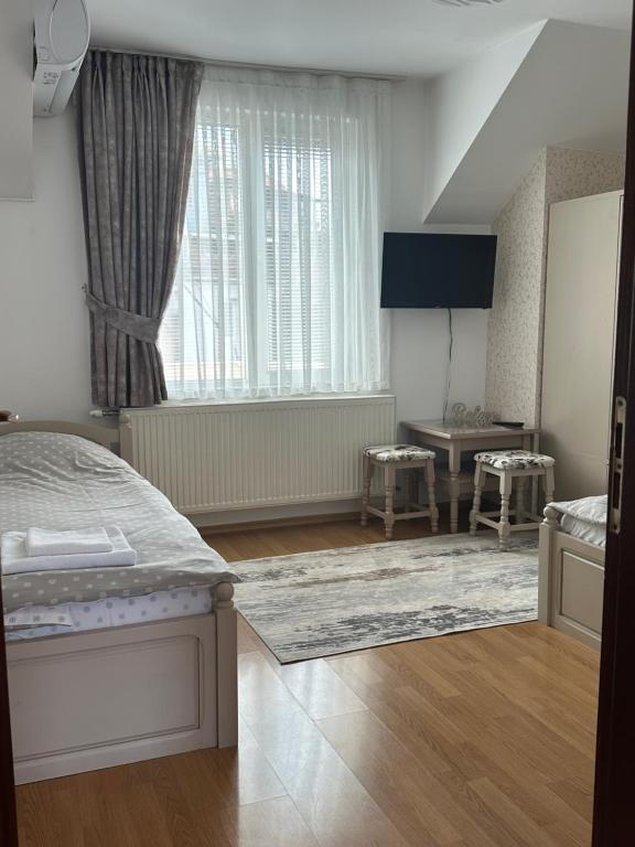 Postel nebo postele na pokoji v ubytování Apartment VEDA 2