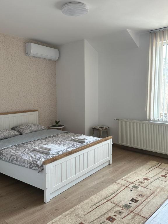 Postel nebo postele na pokoji v ubytování Apartment VEDA 2