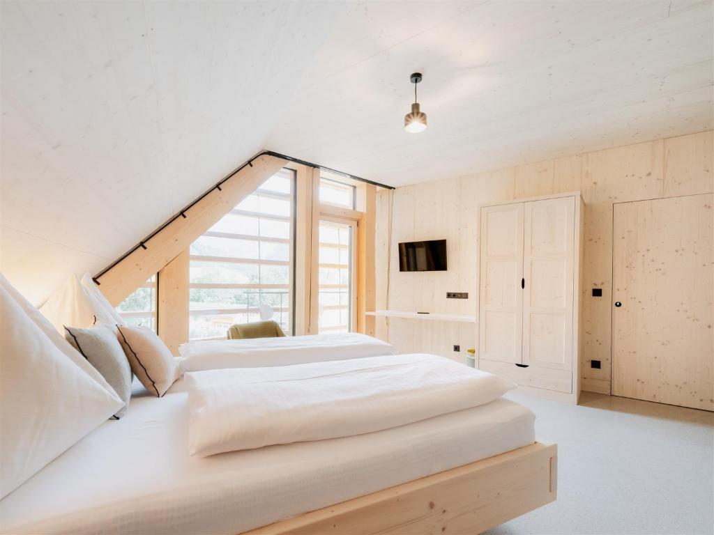 Postel nebo postele na pokoji v ubytování B&B Hotel Zimmerei mit Frühstück