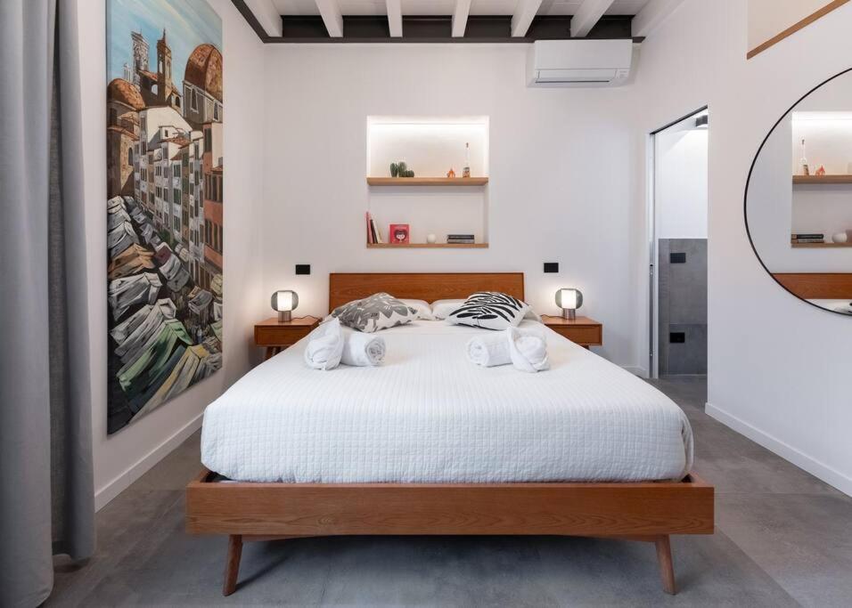 Postel nebo postele na pokoji v ubytování Florence Olive Grove