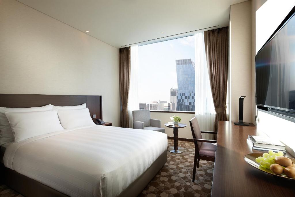TV a/nebo společenská místnost v ubytování LOTTE City Hotel Myeongdong