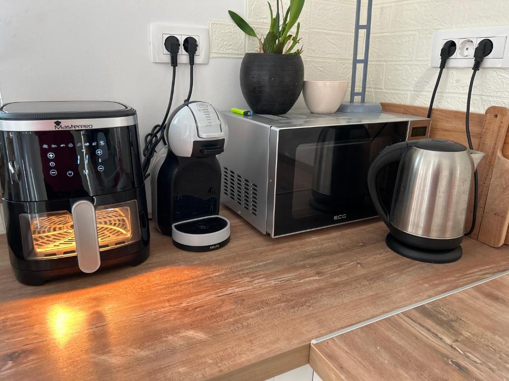 Příslušenství pro přípravu čaje a kávy v ubytování Garden House