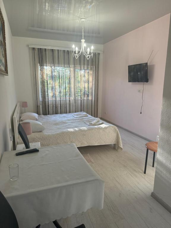Postel nebo postele na pokoji v ubytování ЕЛІТ