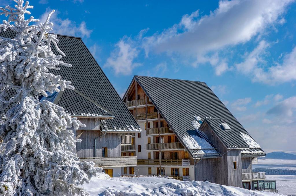 Το Résidence Goélia Les Chalets de Super-Besse τον χειμώνα