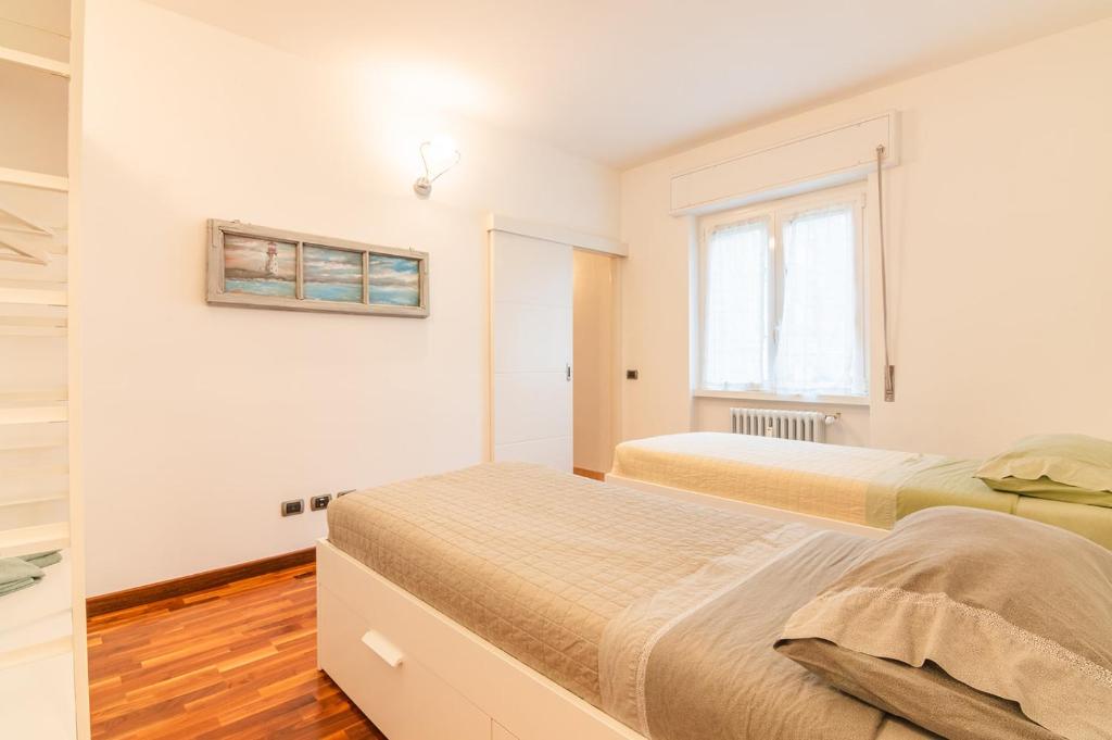 Postel nebo postele na pokoji v ubytování Casa Lella