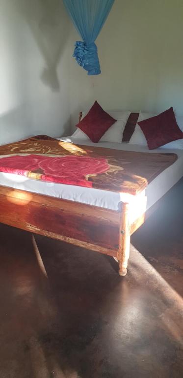 Postel nebo postele na pokoji v ubytování Himansa Homestay
