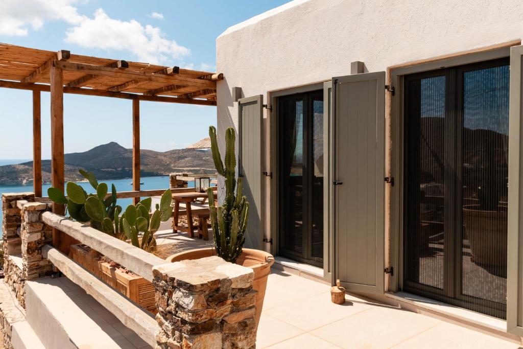 a house with a view of the ocean at Deja Blue Villa 1 in Agios Georgios