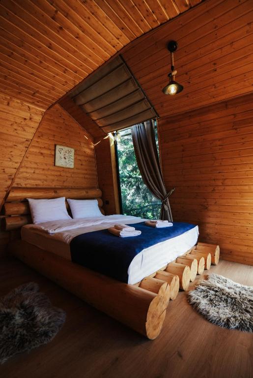 Postel nebo postele na pokoji v ubytování Cottage Galileo in Abastumani
