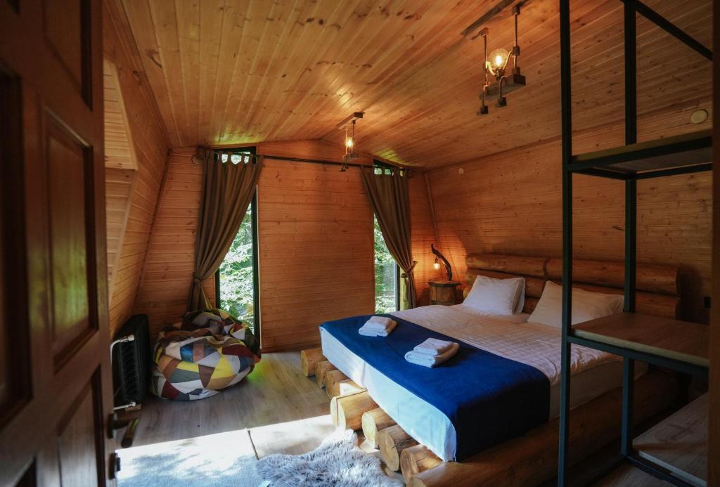 Postel nebo postele na pokoji v ubytování Cottage Galileo in Abastumani