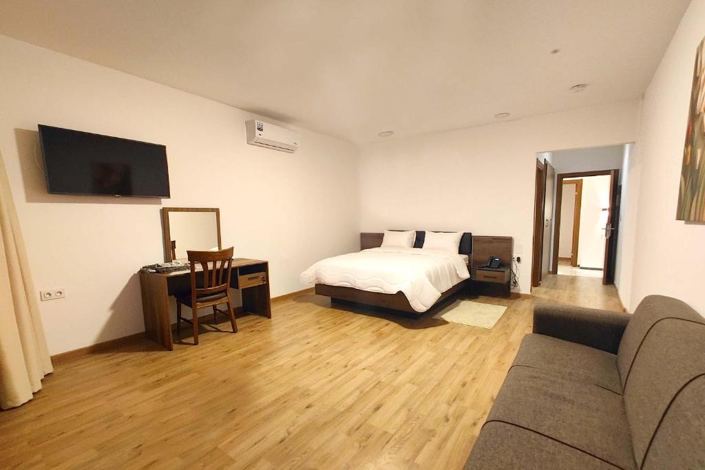Postel nebo postele na pokoji v ubytování Villa Mirasol Hotel