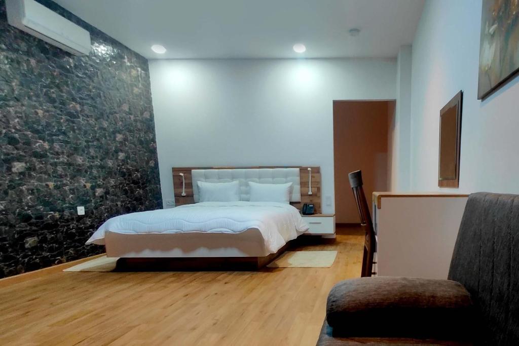Postel nebo postele na pokoji v ubytování Villa Mirasol Hotel