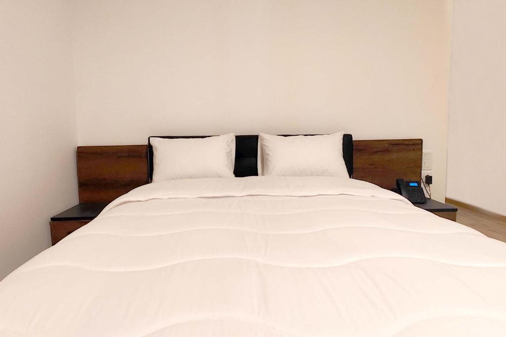 Postel nebo postele na pokoji v ubytování Villa Mirasol Hotel