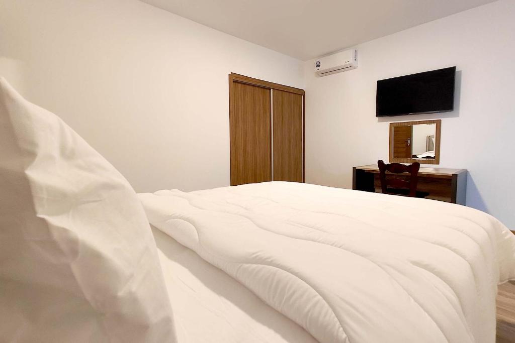 Postel nebo postele na pokoji v ubytování Villa Mirasol Hotel