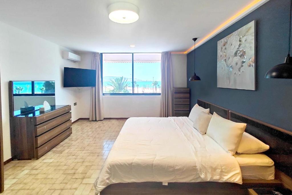Postel nebo postele na pokoji v ubytování Villa Mirasol Hotel